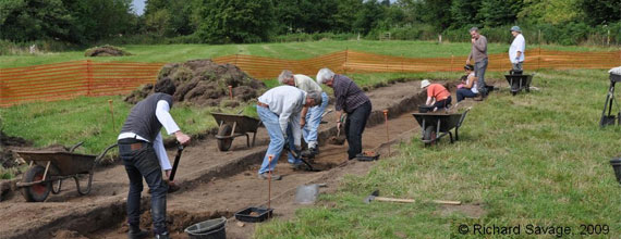 Digging a trench<br />across the filled in moat